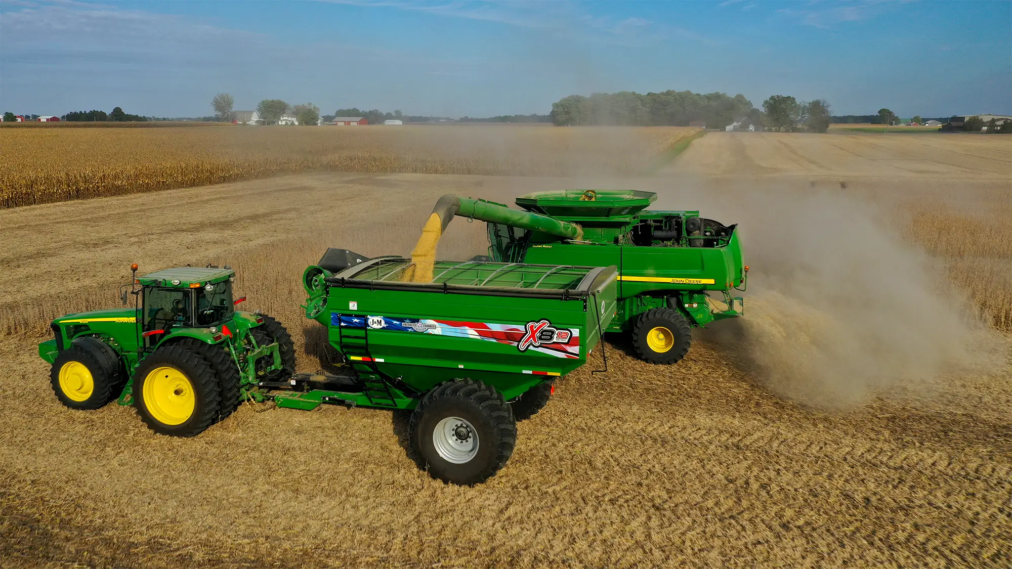 812 green grain cart getting filled