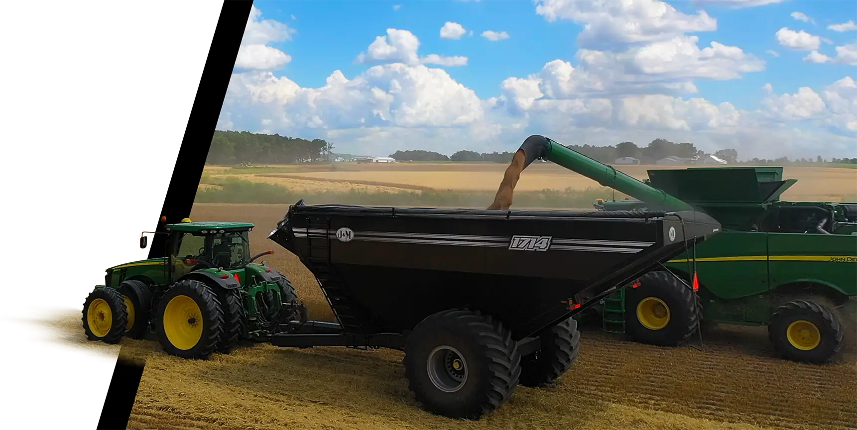 A 1114 being filled by a combine