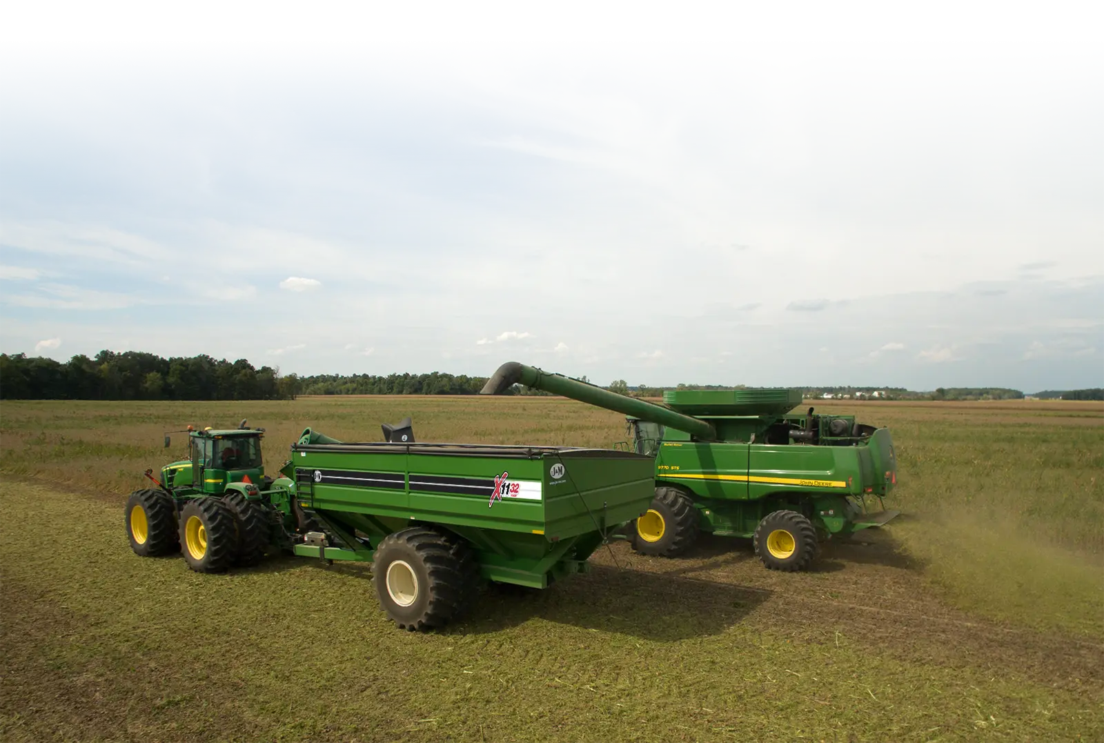 1132 green grain cart in the bean field