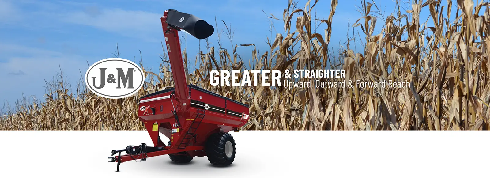 Extended Reach red Grain Cart Picture sitting in front of a corn field