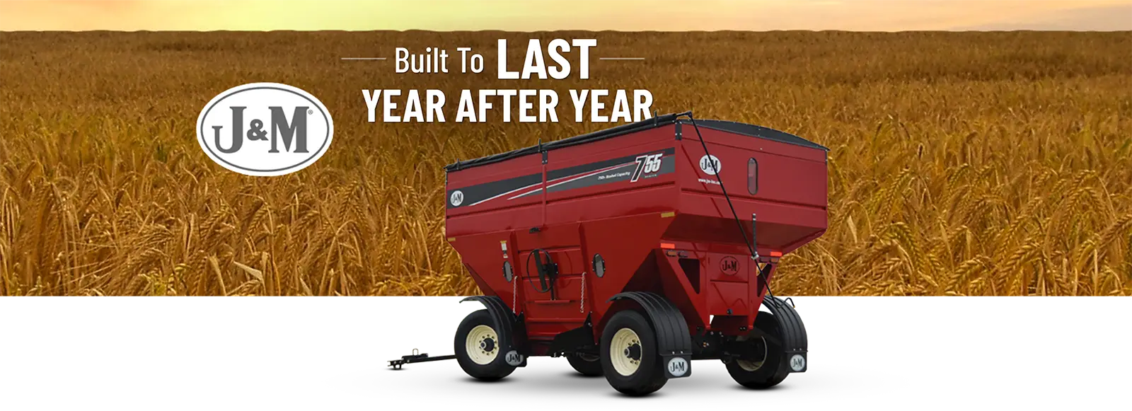 a red 755 sitting in front of a wheat field
