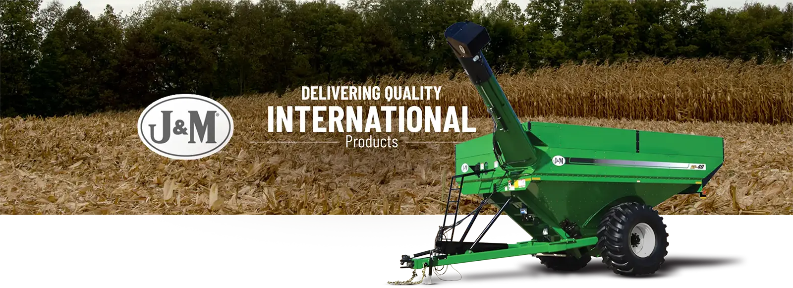 International Grain Cart in front of a corn field