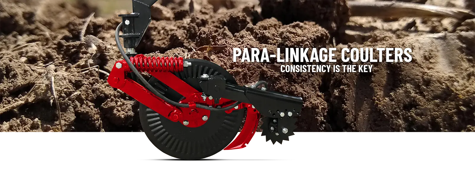 Para-Linkage coulters with dirt in the background highlighting the parallel linkage design that keeps the knife in the ground.