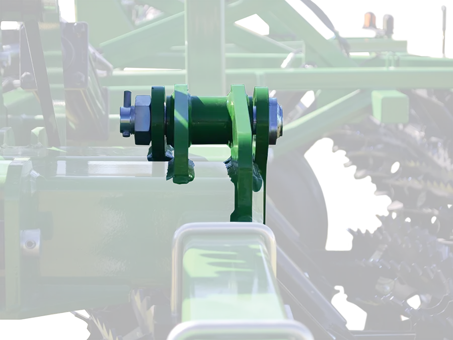 a close up of the large greaseless hinges of a 5-section soil conditioners heavy duty construction