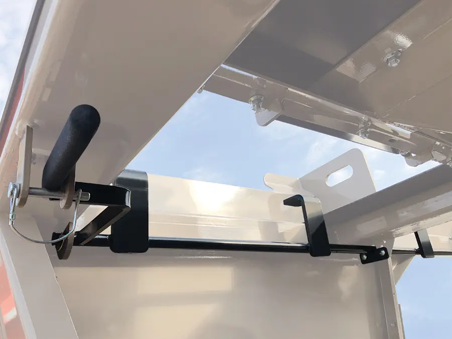 a close up of the latches on the pro box seed tender